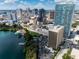 Aerial view of the cityscape and surrounding lake at 150 E Robinson St # 3104, Orlando, FL 32801