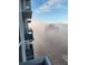 Foggy morning aerial view from a highrise building, showcasing the city below at 150 E Robinson St # 3104, Orlando, FL 32801