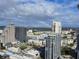 Cityscape view with a vibrant rainbow at 150 E Robinson St # 3104, Orlando, FL 32801