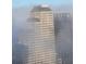 Cityscape with high-rise buildings peeking through morning fog at 150 E Robinson St # 3104, Orlando, FL 32801