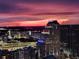 Night aerial view of the city skyline at sunset, with city lights illuminating the scene at 150 E Robinson St # 3104, Orlando, FL 32801