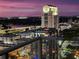 Night aerial view of the city skyline at sunset, with city lights illuminating the scene at 150 E Robinson St # 3104, Orlando, FL 32801