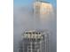 High rise buildings with modern architecture partially covered in fog at 150 E Robinson St # 3104, Orlando, FL 32801