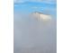 High-rise building partially obscured by fog, offering a unique perspective at 150 E Robinson St # 3104, Orlando, FL 32801