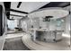 Modern circular bar with seating and built-in TV at 150 E Robinson St # 3104, Orlando, FL 32801