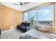 Comfortable bedroom with city views, ceiling fan and plenty of natural light at 150 E Robinson St # 3104, Orlando, FL 32801