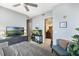 Spacious bedroom with large TV, fish tank, and ensuite bathroom at 150 E Robinson St # 3104, Orlando, FL 32801
