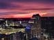 Stunning sunset over downtown buildings with dramatic clouds at dusk at 150 E Robinson St # 3104, Orlando, FL 32801