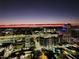 Gorgeous city skyline at night with bright lights and colorful sunset skies at 150 E Robinson St # 3104, Orlando, FL 32801