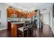 Modern kitchen with granite countertops and wood cabinets at 150 E Robinson St # 3104, Orlando, FL 32801