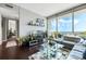 Living room features a large TV, city views and comfortable seating at 150 E Robinson St # 3104, Orlando, FL 32801