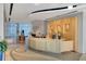Modern building lobby with a welcoming reception desk at 150 E Robinson St # 3104, Orlando, FL 32801