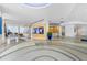 Elegant condo lobby with seating area and artwork at 150 E Robinson St # 3104, Orlando, FL 32801