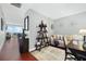 Home office with built-in shelving and hardwood floors at 150 E Robinson St # 3104, Orlando, FL 32801
