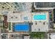 Aerial view of a community pool and basketball court at 150 E Robinson St # 3104, Orlando, FL 32801