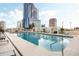 Resort-style pool with comfortable lounge chairs at 150 E Robinson St # 3104, Orlando, FL 32801