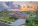 Attractive single-Gathering home with a two-car garage and lush landscaping at 169 Magneta Loop, Auburndale, FL 33823