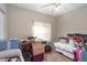 Bedroom with hardwood floors, currently being used for storage at 17478 Se 115Th Terrace Rd, Summerfield, FL 34491