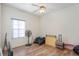 Spacious bedroom with wood flooring and window at 17478 Se 115Th Terrace Rd, Summerfield, FL 34491