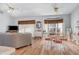 Dining area with table, chairs and a birdcage at 17478 Se 115Th Terrace Rd, Summerfield, FL 34491
