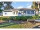 Rear view of the house showing a screened porch at 17478 Se 115Th Terrace Rd, Summerfield, FL 34491