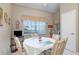 Cozy kitchen nook with round table and seating for four at 17478 Se 115Th Terrace Rd, Summerfield, FL 34491