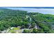 Aerial view of waterfront community near water tower at 1778 Cr 426, Lake Panasoffkee, FL 33538