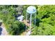 Aerial view of a home near a water tower at 1778 Cr 426, Lake Panasoffkee, FL 33538
