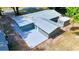 Aerial view of a house with metal roof and detached shed at 1778 Cr 426, Lake Panasoffkee, FL 33538