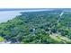 Wide aerial view of lakeside neighborhood at 1778 Cr 426, Lake Panasoffkee, FL 33538