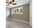 Bedroom featuring new flooring and a ceiling fan at 1778 Cr 426, Lake Panasoffkee, FL 33538