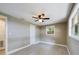 Spacious bedroom with ceiling fan and new flooring at 1778 Cr 426, Lake Panasoffkee, FL 33538