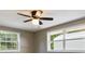 Bright bedroom with ceiling fan and new windows at 1778 Cr 426, Lake Panasoffkee, FL 33538
