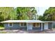 Newly renovated home with gray siding and metal roof at 1778 Cr 426, Lake Panasoffkee, FL 33538
