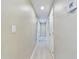 Clean hallway with new flooring and neutral walls at 1778 Cr 426, Lake Panasoffkee, FL 33538