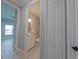 Small bathroom with toilet and sink at 227 W 4Th St, Chuluota, FL 32766