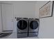 Convenient laundry room with washer and dryer at 227 W 4Th St, Chuluota, FL 32766