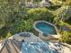 Aerial view of the property showing pool and patio at 230 W Spring Lake Dr, Altamonte Springs, FL 32714