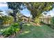 Private backyard with hammock and lush landscaping at 230 W Spring Lake Dr, Altamonte Springs, FL 32714