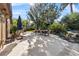 Outdoor patio furniture beneath lush landscaping near pool at 230 W Spring Lake Dr, Altamonte Springs, FL 32714