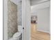 Powder room, neutral colors, and patterned wallpaper at 230 W Spring Lake Dr, Altamonte Springs, FL 32714