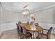 Elegant dining room featuring a large table and chairs at 230 W Spring Lake Dr, Altamonte Springs, FL 32714