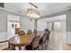 Formal dining room with hardwood floors and chandelier at 230 W Spring Lake Dr, Altamonte Springs, FL 32714