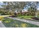 Charming home with lush landscaping and mature trees at 230 W Spring Lake Dr, Altamonte Springs, FL 32714