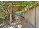 Charming pathway through a garden with wooden arbor at 230 W Spring Lake Dr, Altamonte Springs, FL 32714