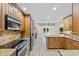 Kitchen features granite countertops and stainless steel appliances at 230 W Spring Lake Dr, Altamonte Springs, FL 32714