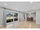 Living room with hardwood floors and view of the street at 230 W Spring Lake Dr, Altamonte Springs, FL 32714