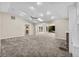 Spacious living room with vaulted ceiling, fireplace and access to backyard patio at 230 W Spring Lake Dr, Altamonte Springs, FL 32714