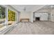 Living room with a view of the backyard pool and spa at 230 W Spring Lake Dr, Altamonte Springs, FL 32714