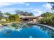 Inviting swimming pool with spa and patio area at 230 W Spring Lake Dr, Altamonte Springs, FL 32714